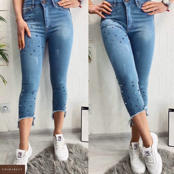 Приобрести в подарок джинсы женские стрейч длина 7/8 рваный низ бусинками украшены светло-голубого цвета больших размеров оптом Украина