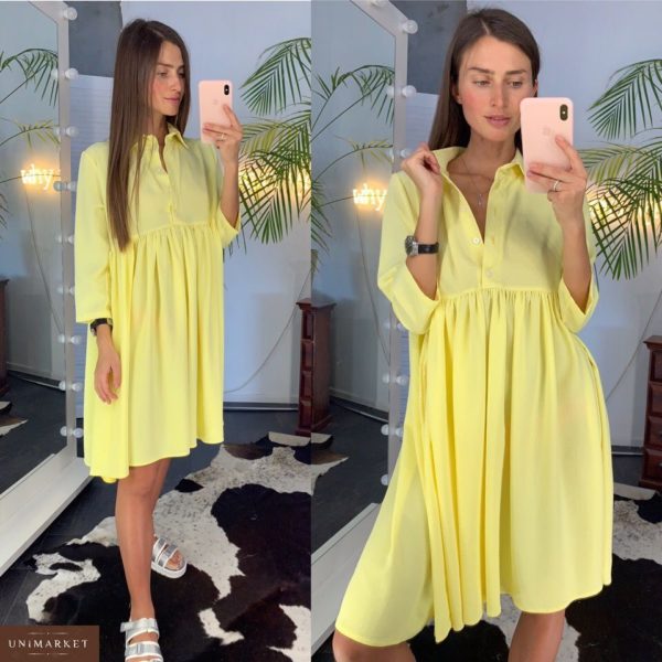 Купити дешево жіночу сукню вільного крою з креп-шовку жовтого кольору недорого