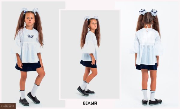 Приобрести недорого блузу на завязочках детскую школьную, снизу удлиненную белого цвета оптом Украина