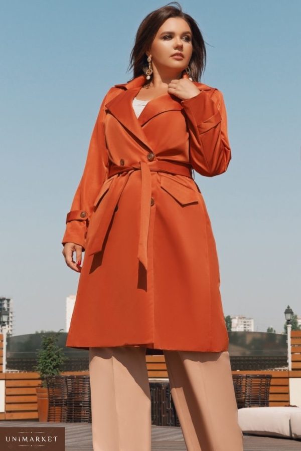 Приобрести в интернет-магазине женский с поясом тренч по бокам два кармана рукава с хлястиками цвета оранж больших размеров дешево