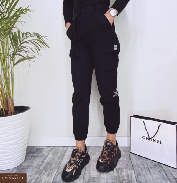Придбати недорого жіночі штани карго з поясом і кишенями чорного кольору оптом Україна