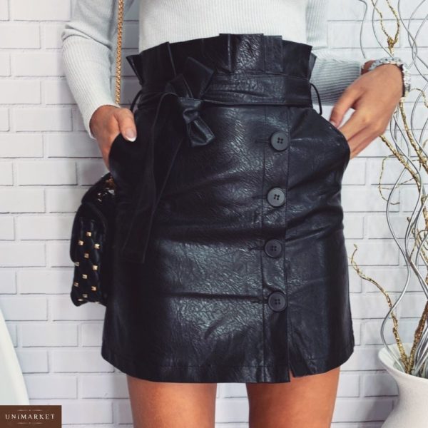 Приобрести недорого женскую юбку из экокожи с пуговицами и поясом цвета черного оптом Украина