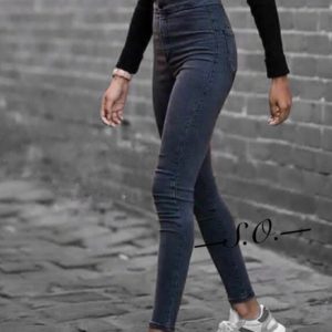 Приобрести недорого женские джинсы скинни с высокой посадкой черного цвета оптом Украина