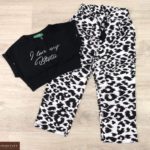 Купити чорно-білий дитячий трикотажний комплект: топ з леопардовими штанами за низькими цінами