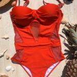 Купити червоний жіночий злитий купальник зі вставками з сітки в Одесі