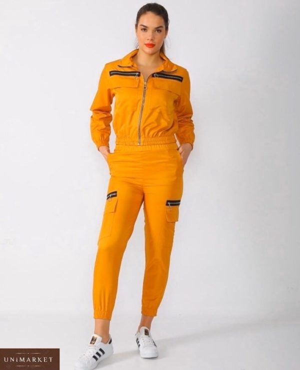 Замовити жовтого кольору Спортивний костюм для жінок з плащової тканини з змійкам онлайн
