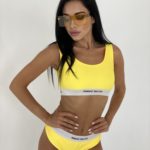 Придбати жовтий жіночий купальник-трійка в спортивному стилі: два топа + плавки (розмір 40-50) вигідно