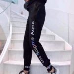 Замовити чорні жіночі трикотажні штани з написом онлайн