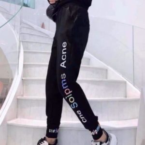 Заказать черные женские трикотажные штаны с надписью онлайн