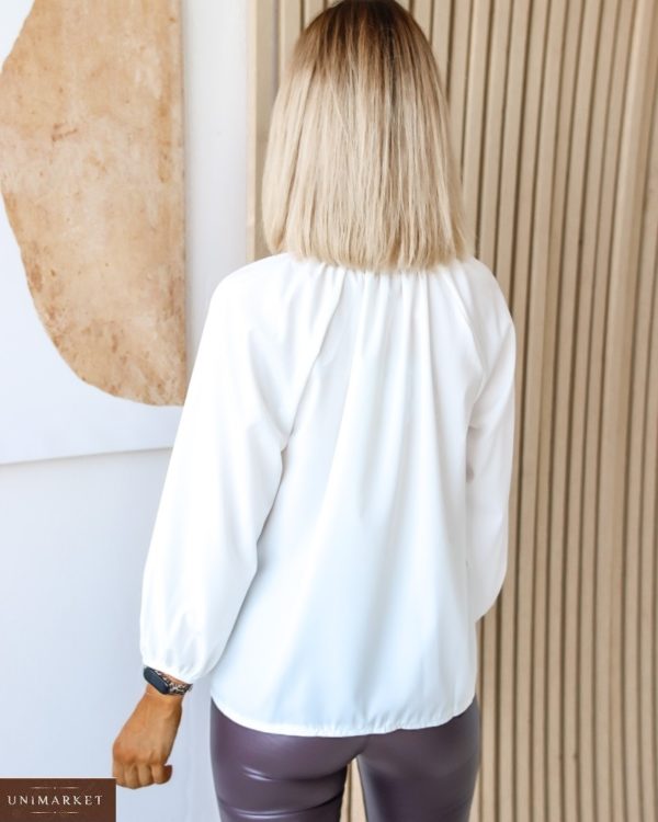 Придбати жіночу білого кольору ніжну блузку з зав'язкою (розмір 42-56) в Україні