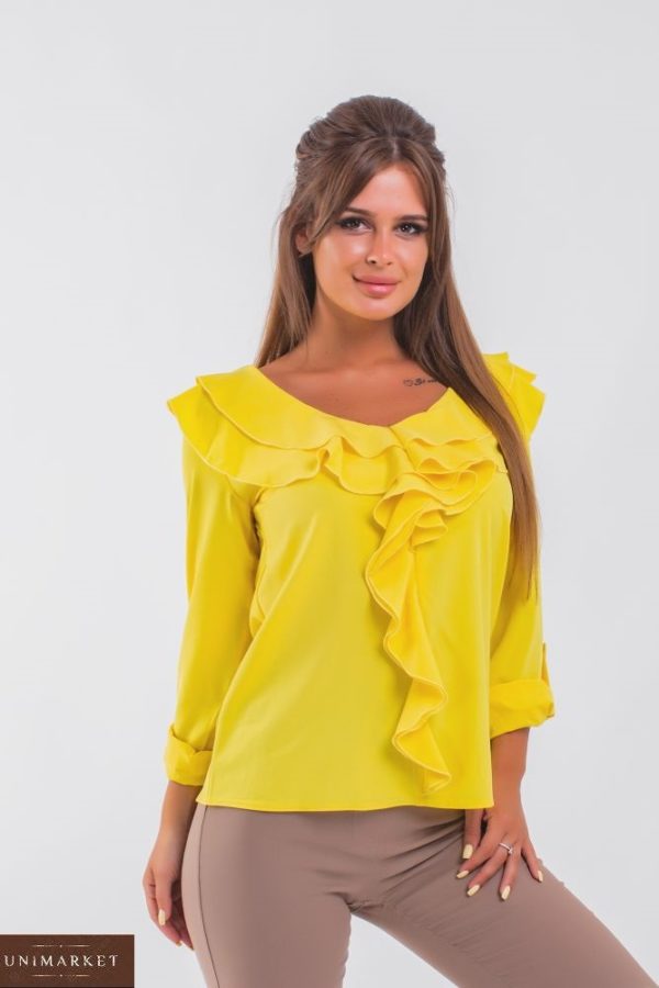 Придбати жіночу блузку з рюшами жовтого кольору з довгим рукавом вигідно