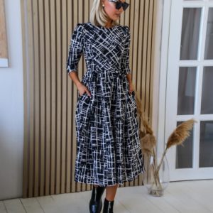 Купити в інтернеті сукню міді з пишною спідницею з костюмкі (розмір 42-48) чорного кольору для жінок