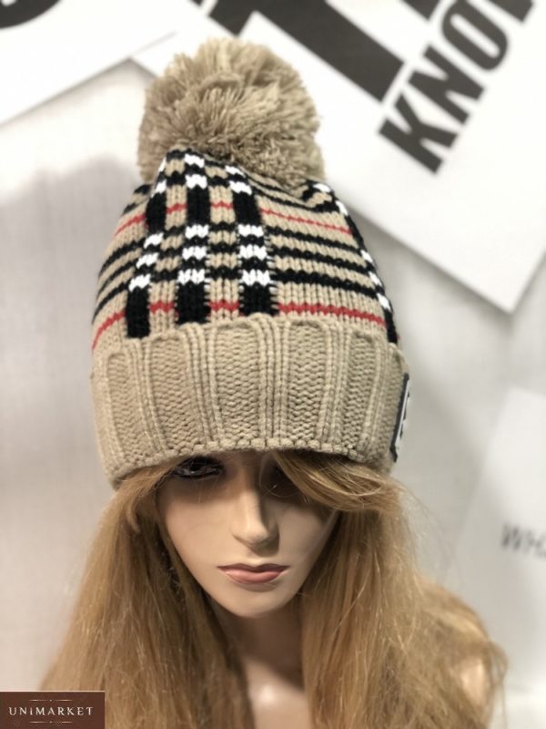 Замовити беж жіночу в'язану шапку на зиму в клітку вигідно