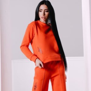 Замовити жіночий прогулянковий костюм помаранчевого кольору зі світшоти з трехніткі на флісі недорого