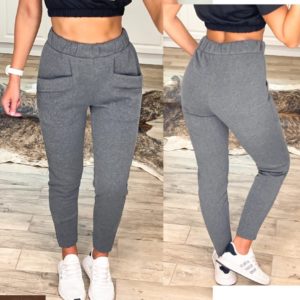 Замовити в інтернеті жіночі спортивні штани з трехніткі з кишенями (розмір 42-48) сірого кольору на зиму
