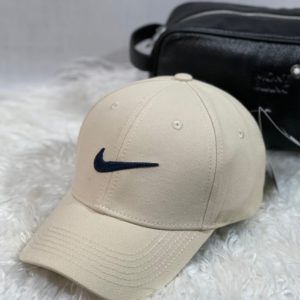 Заказать бежевого цвета женскую и мужскую бейсболку з логотипом Nike в интернете