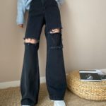 Замовити жіночі чорні широкі джинси з розрізами в інтернеті