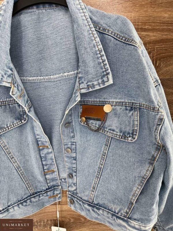 Замовити по знижці блакитну джинсову куртку з акцентом на кишені для жінок