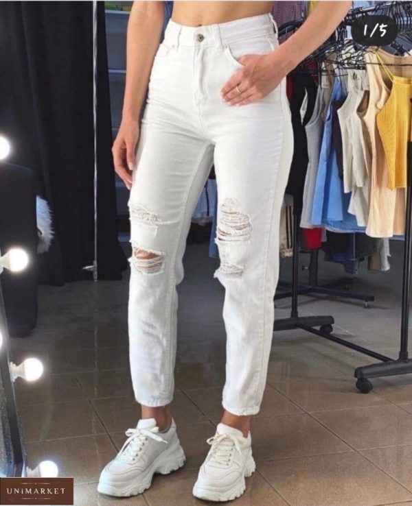Замовити онлайн білі джинси з прорізами і потертостями для жінок