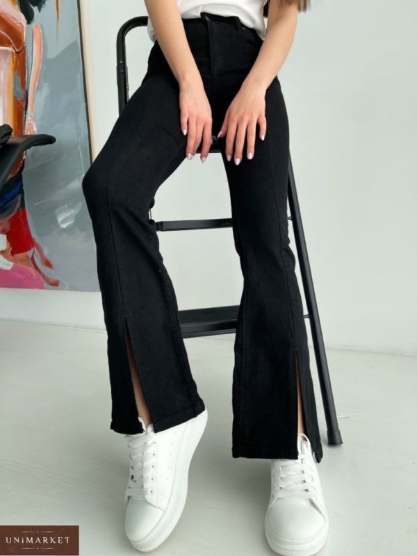 Купити в інтернеті жіночі джинси кльош з розрізами чорного кольору