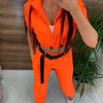 Приобрести оранжевый яркий прогулочный женский костюм в Украине