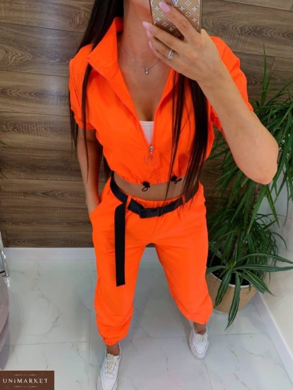 Приобрести оранжевый яркий прогулочный женский костюм в Украине