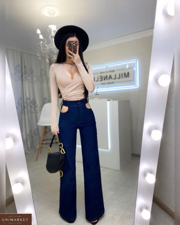 Купити темно-синього кольору жіночі високі джинси з вирізами в Україні