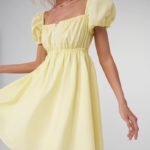 Замовити недорого жіноче літнє плаття зі шнурівкою на грудях жовтого кольору