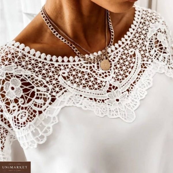 Придбати білу жіночу вільну блузку з мереживом вигідно