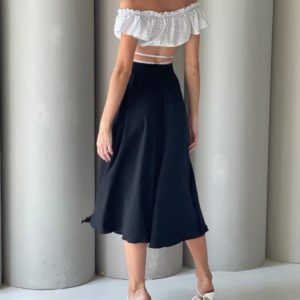 Приобрести по скидке женскую юбку из софт-шелка с разрезом (размер 42-52) черного цвета