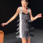 Купити на новий рік жіноча коктейльна сукня з бахромою чорно-білого кольору