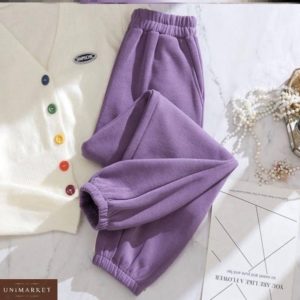 Приобрести по скидке лиловые тёплые спортивные штаны на резинке для женщин