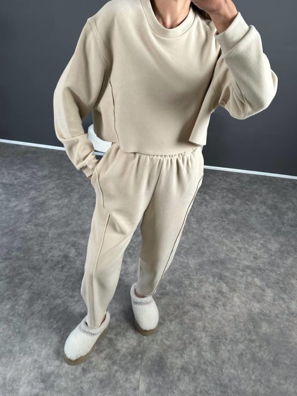Заказать через интернет Купить женский спортивный костюм светлый бежевый черный белый хорошего качества по оптимальной цене недорогой свободного кроя с необработанными краями свободный худи в Украине